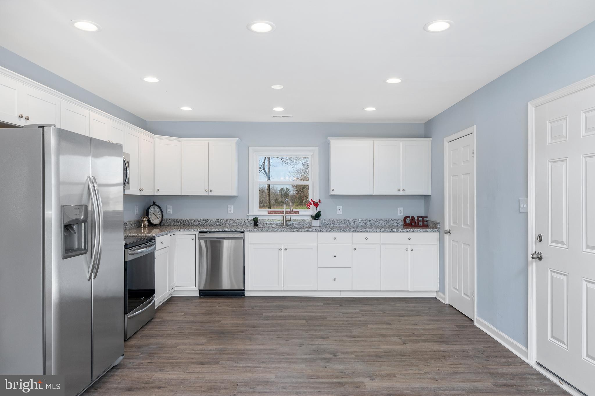 2334 Mt Olive Road Beaverdam, VA 23015 - Photo 6 of 37 Laundry room & half bath off kitchen
