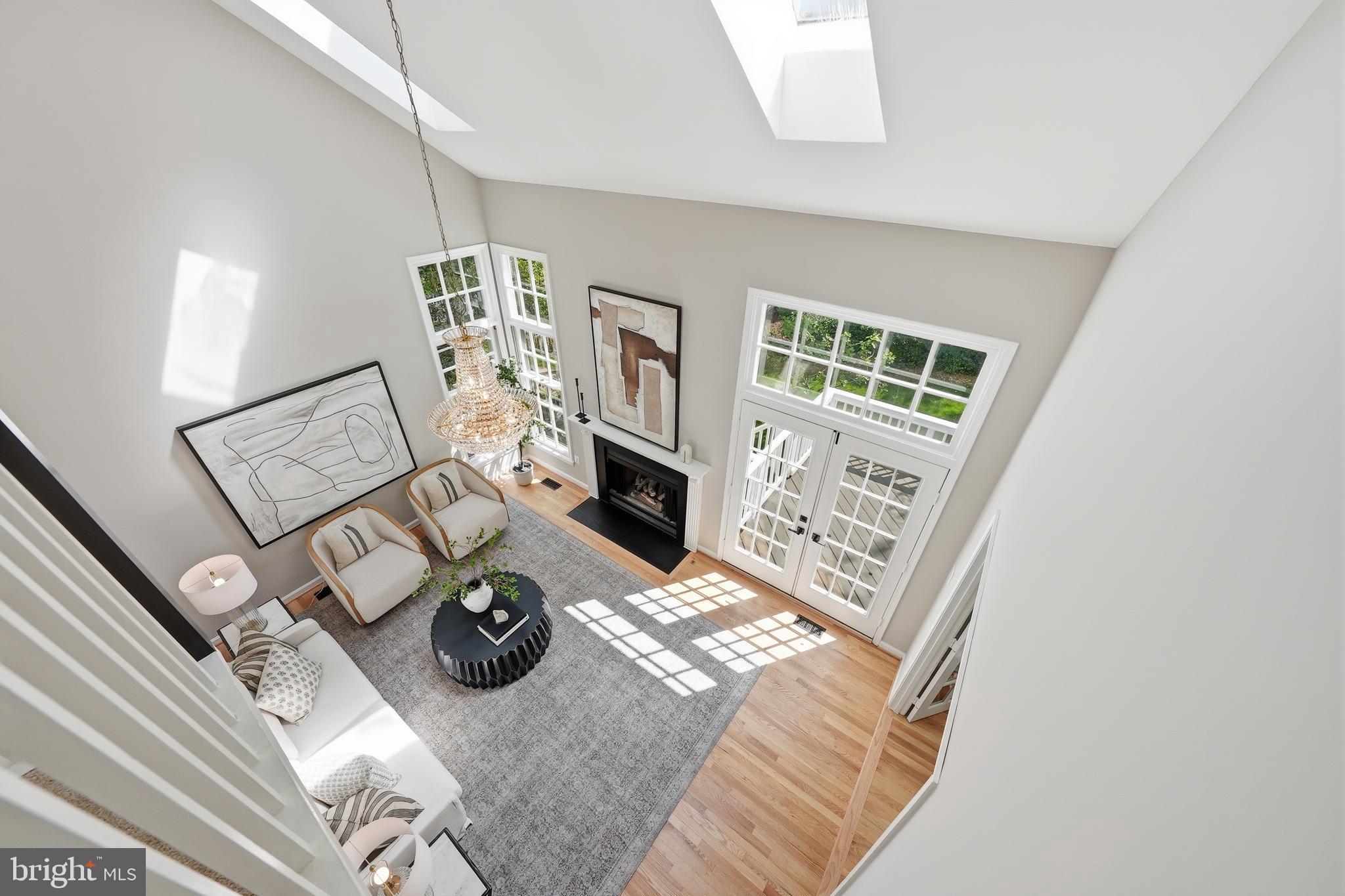 1291 Lamplighter Way Reston, VA 20194 - Photo 42 of 60 a living room with furniture and a fireplace