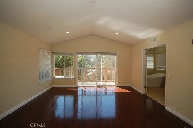 a bathroom with a double vanity sink and a bathtub