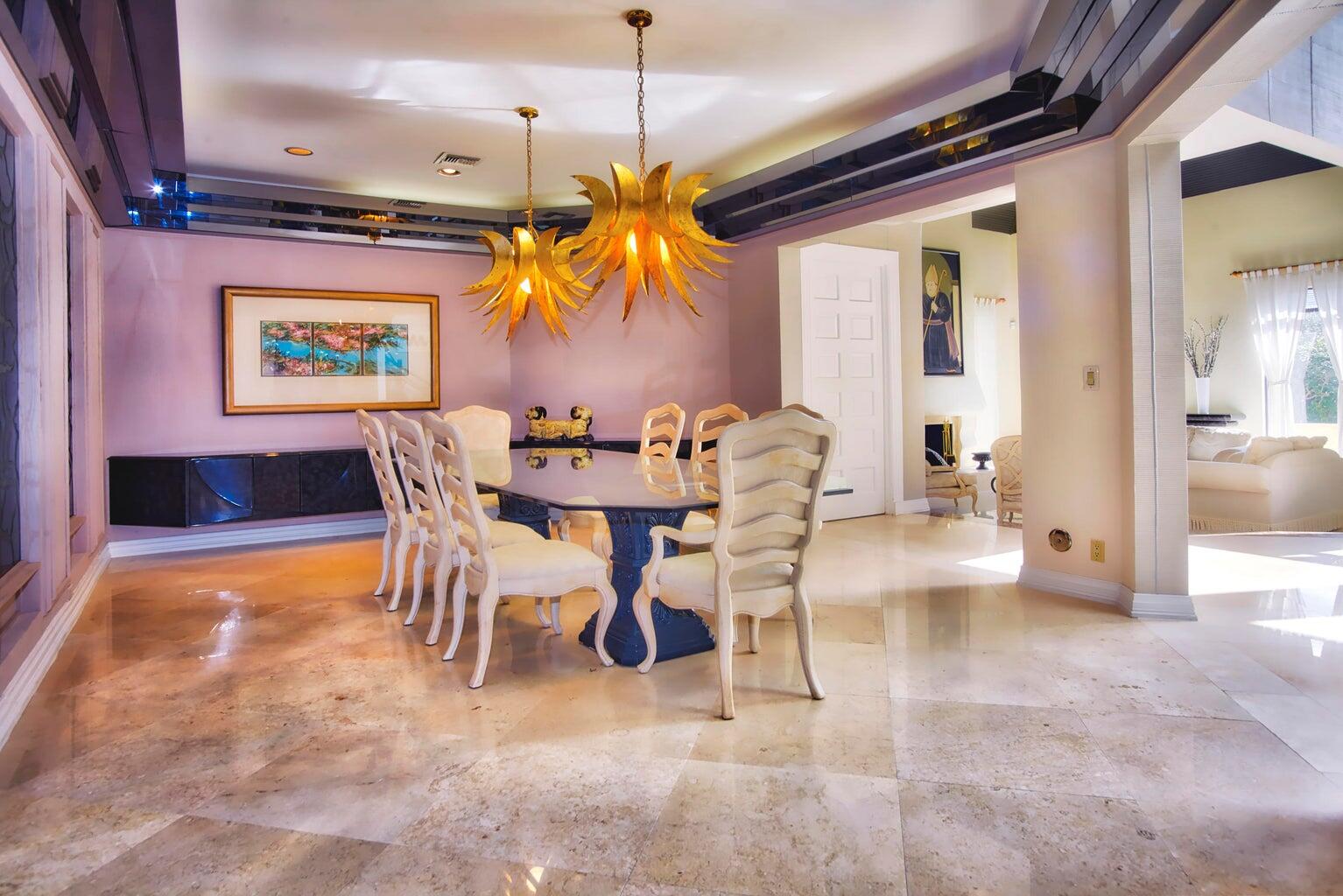 21125 Hamlin Drive Boca Raton, FL 33433 - Photo 12 of 69 a view of a dining room with furniture and chandelier