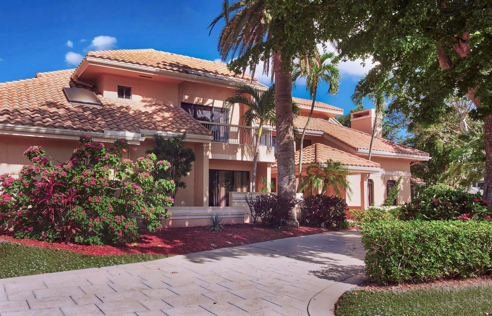 21125 Hamlin Drive Boca Raton, FL 33433 - Photo 2 of 69 a front view of a house