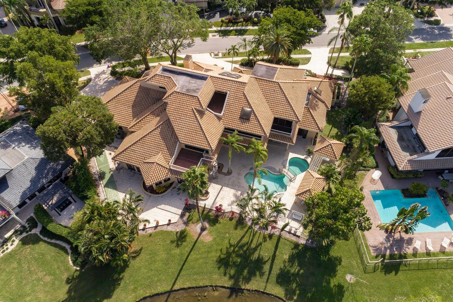 21125 Hamlin Drive Boca Raton, FL 33433 - Photo 44 of 69 an aerial view of a house with a yard