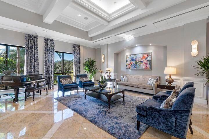 21125 Hamlin Drive Boca Raton, FL 33433 - Photo 56 of 69 a living room with furniture potted plant and a large window