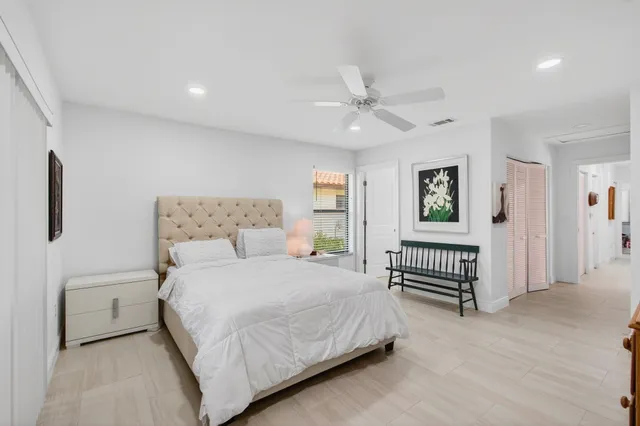 a view of a swimming pool with a lounge chairs