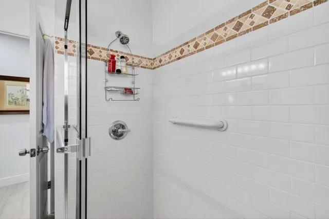 a kitchen with a table and chairs in it