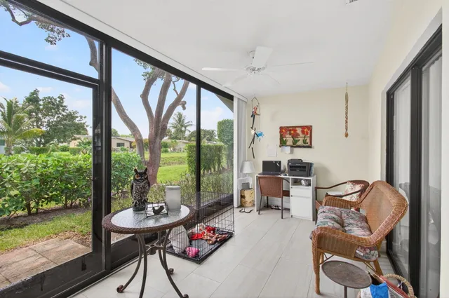 a kitchen with a table and chairs in it