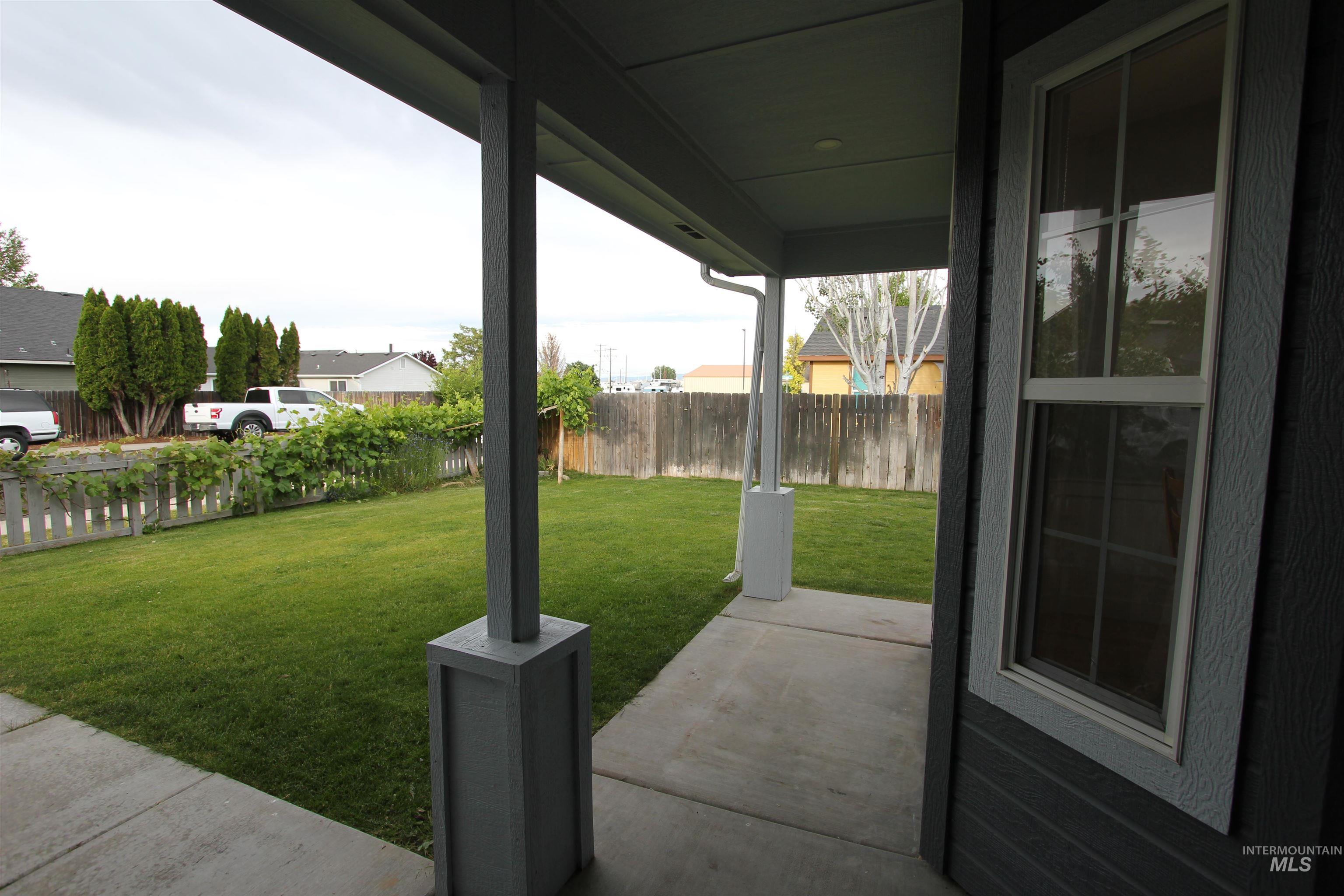4816 Kadie Street Caldwell, ID 83607 - Photo 5 of 23 Covered porch with concrete flooring and substantial support columns