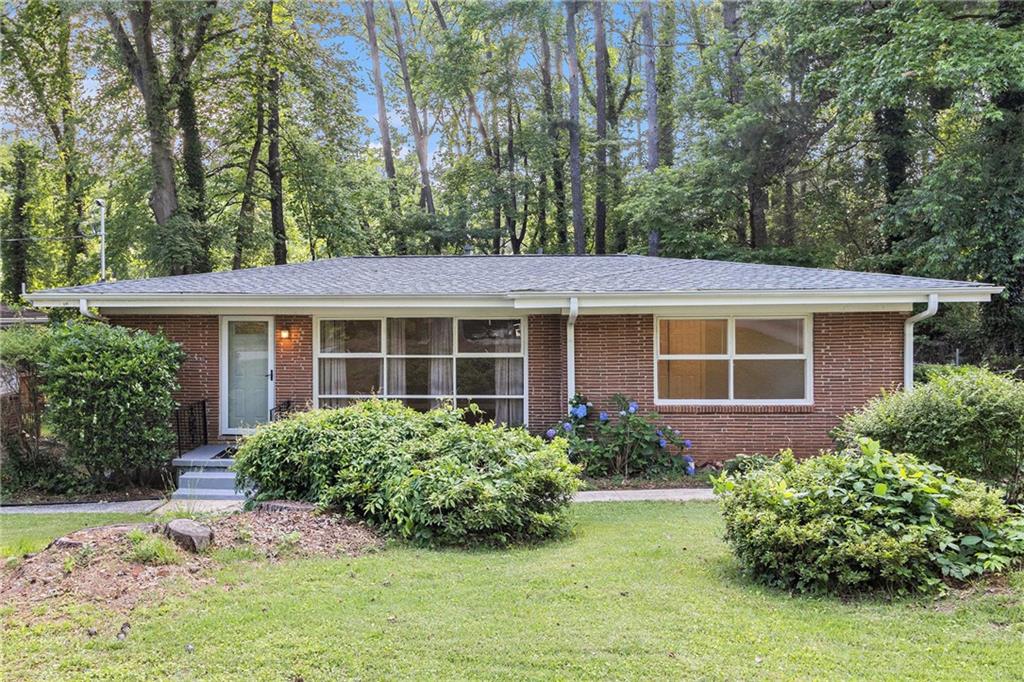 front view of a house with a yard