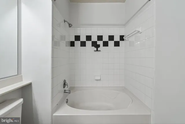 a bathroom with a bathtub