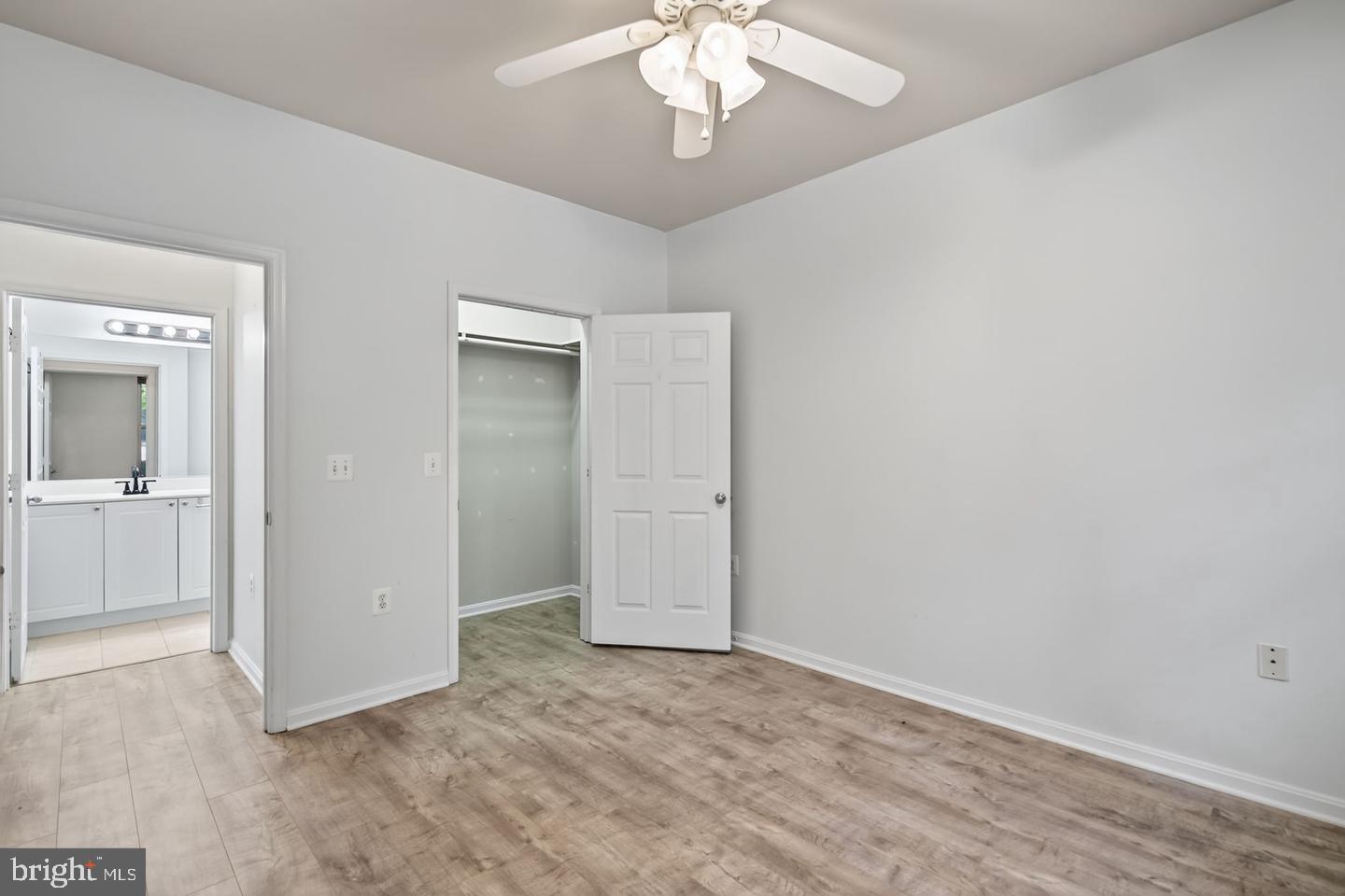 9490 Virginia Center Boulevard, Unit 127 Vienna, VA 22181 - Photo 16 of 31 wooden floor in an empty room
