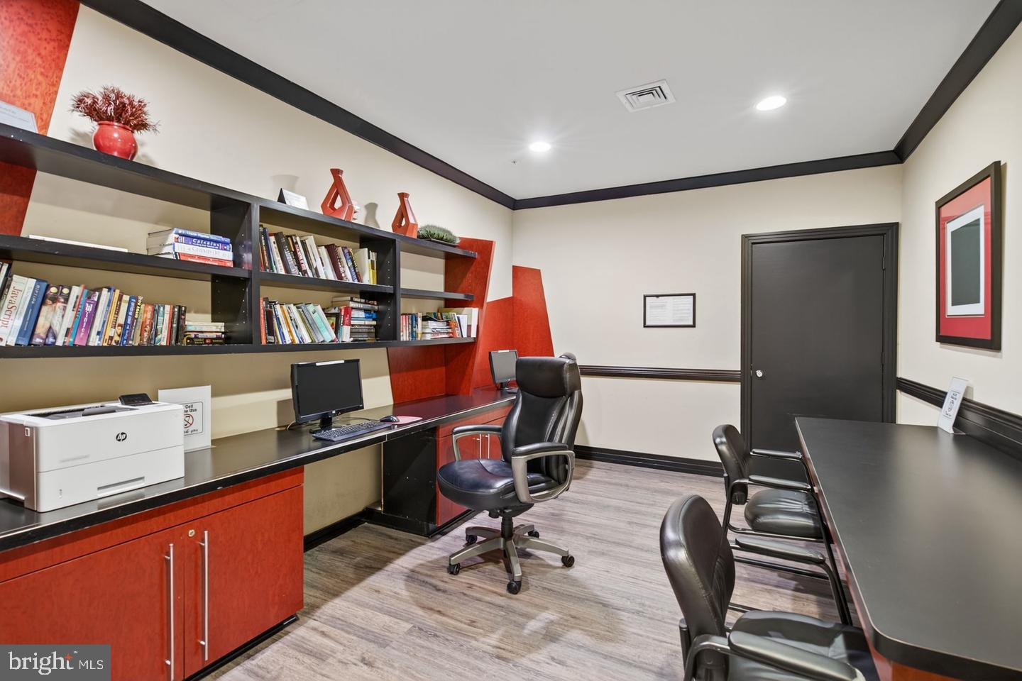 9490 Virginia Center Boulevard, Unit 127 Vienna, VA 22181 - Photo 19 of 31 a view of a workspace with furniture