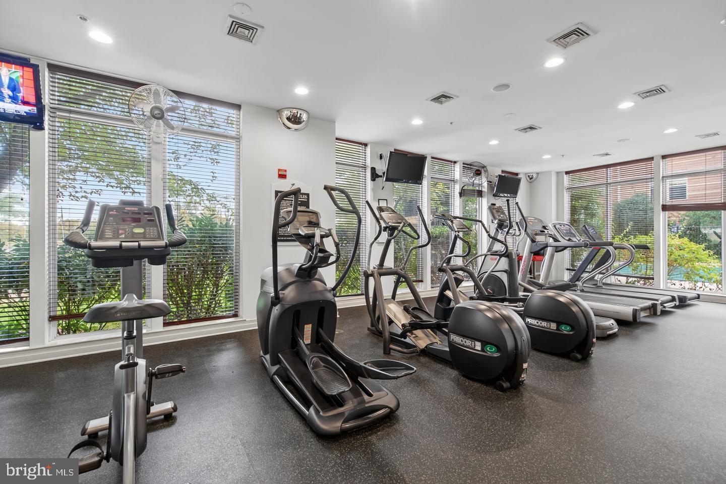 9490 Virginia Center Boulevard, Unit 127 Vienna, VA 22181 - Photo 21 of 31 a view of a room with gym equipment