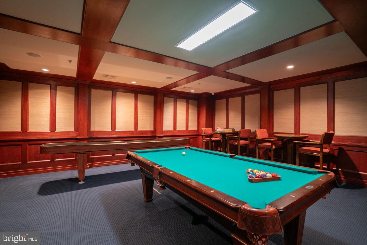 9490 Virginia Center Boulevard, Unit 127 Vienna, VA 22181 - Photo 24 of 31 a room with pool table and windows