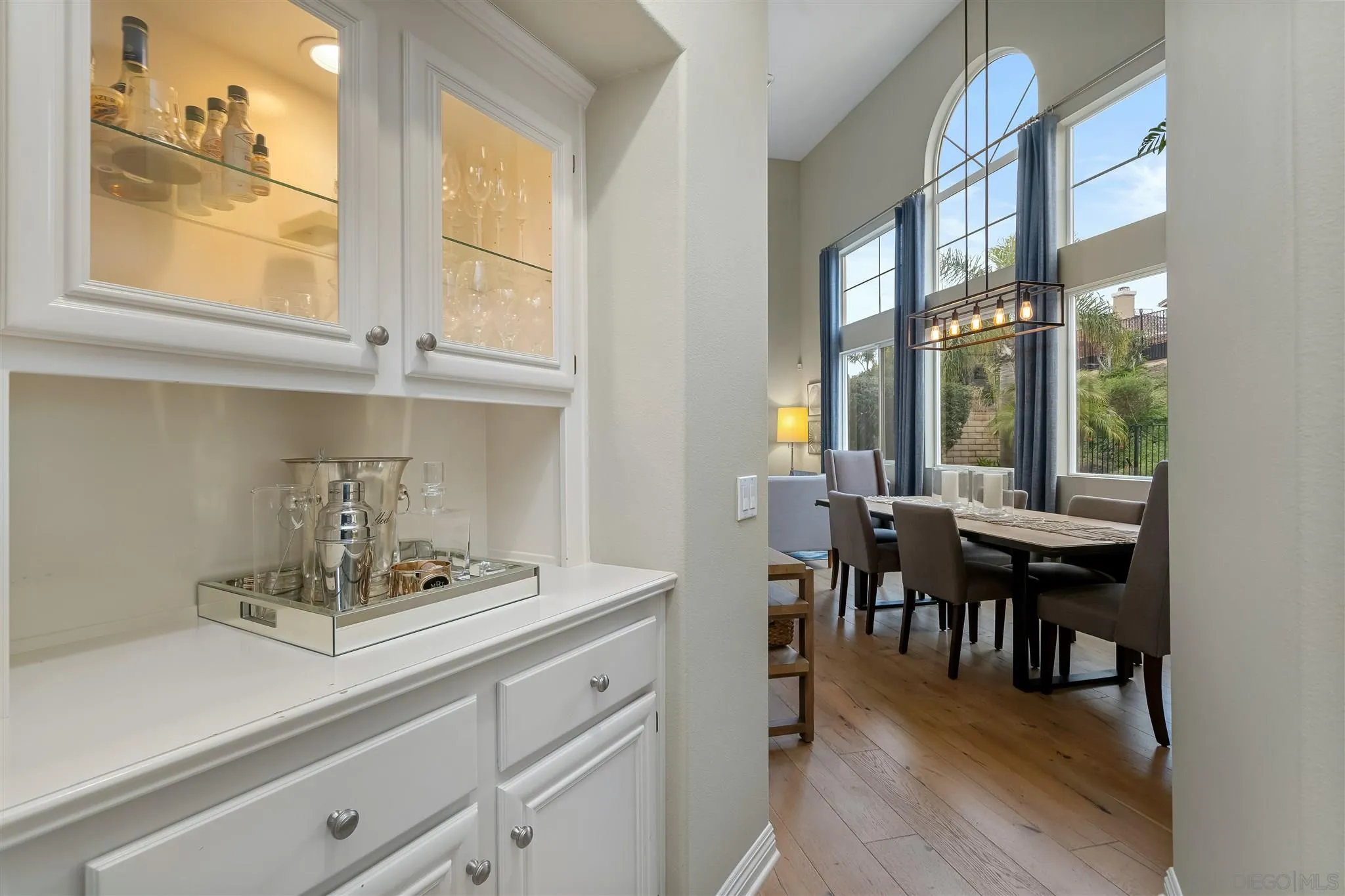 6716 Tea Tree Street Carlsbad, CA 92011 - Photo 8 of 39 a view of dining table chairs and chandelier