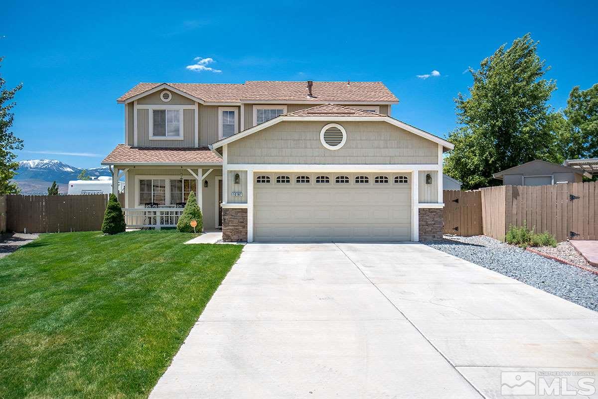 10187 Cascade Falls Court Reno, NV 89521 - Photo 1 of 1 a front view of a house with a garden