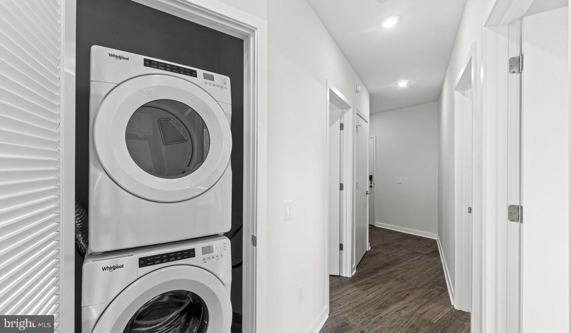 4000 Wisconsin Avenue Northwest, Unit 4K236 Washington, DC 20016 - Photo 26 of 54 a view of a hallway with washer and dryer