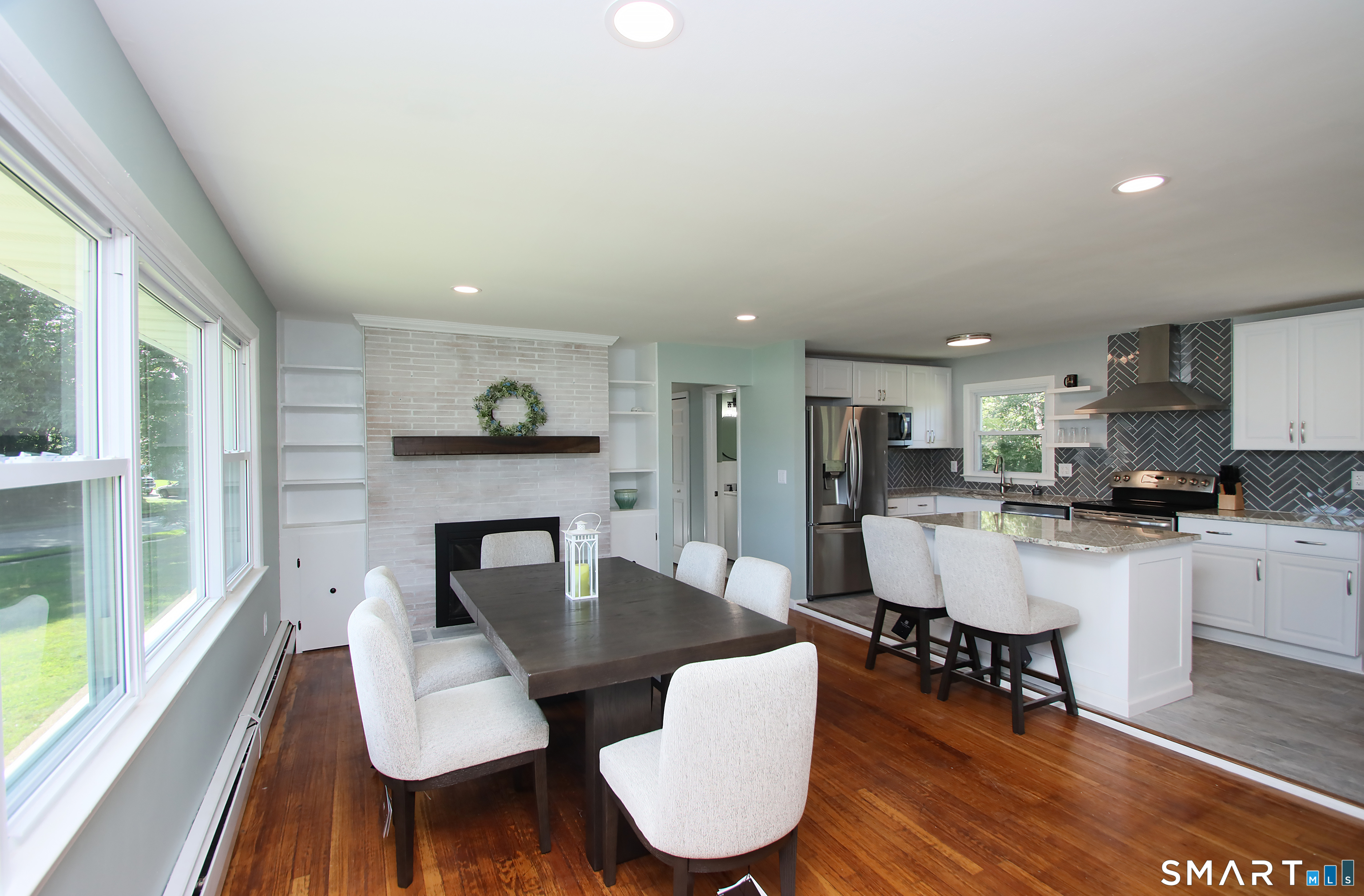 63 Ridgetop Road Wallingford, CT 06492 - Photo 11 of 28 fireplaced dining area