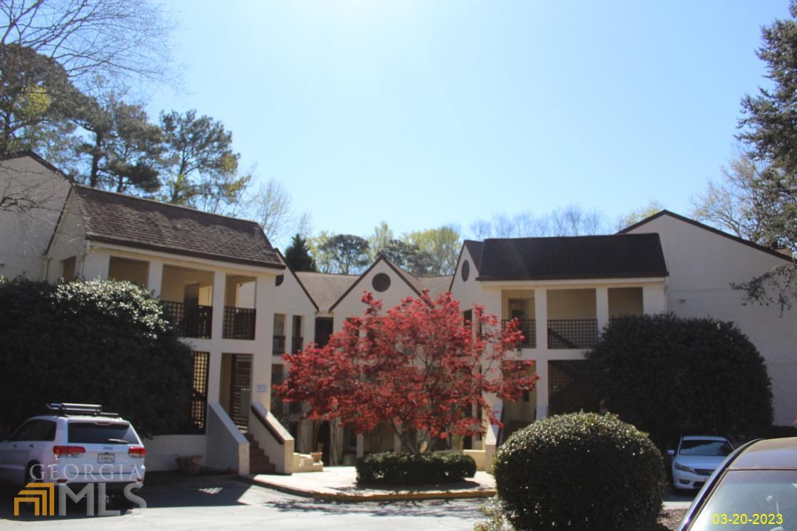 475 Sherman Way, Unit 215A Decatur, GA 30033 - Photo 1 of 1 a front view of house with yard