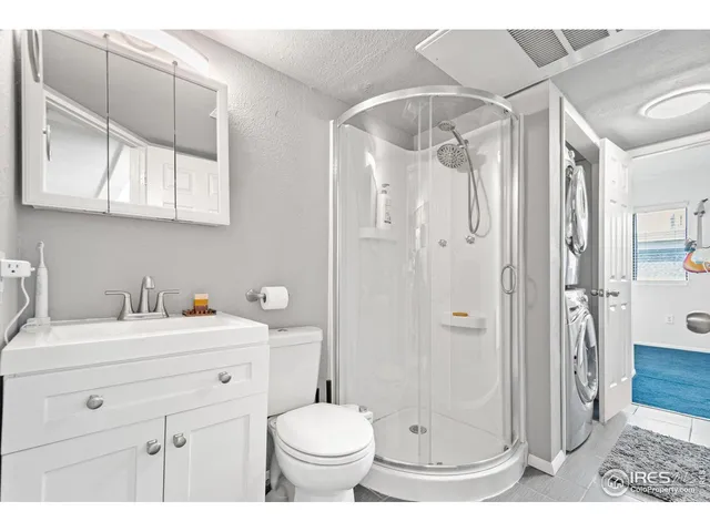 a view of a swimming pool with an outdoor seating