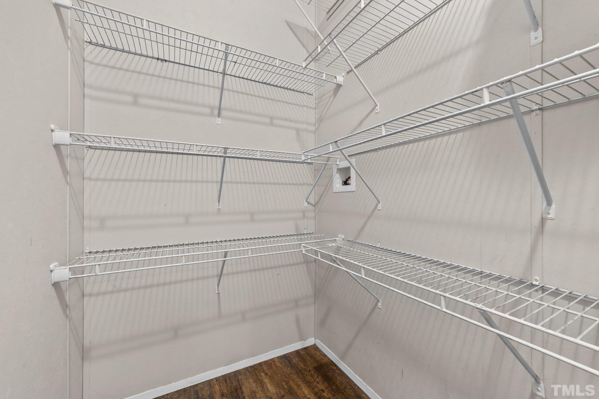 11242 Bissette Road Middlesex, NC 27557 - Photo 24 of 24 a view of a room with racks on the wall