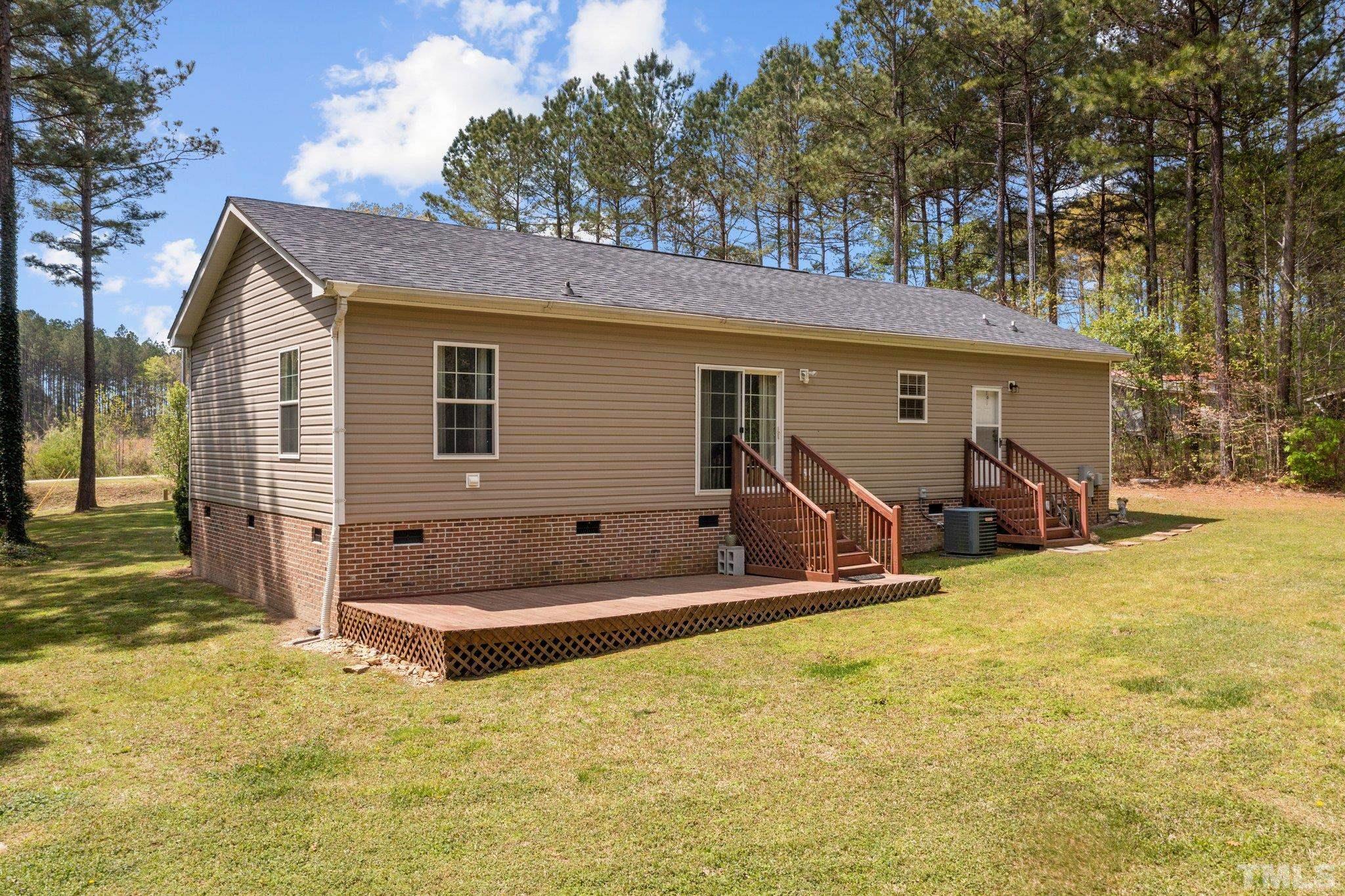 11242 Bissette Road Middlesex, NC 27557 - Photo 6 of 24 a view of outdoor space yard and deck