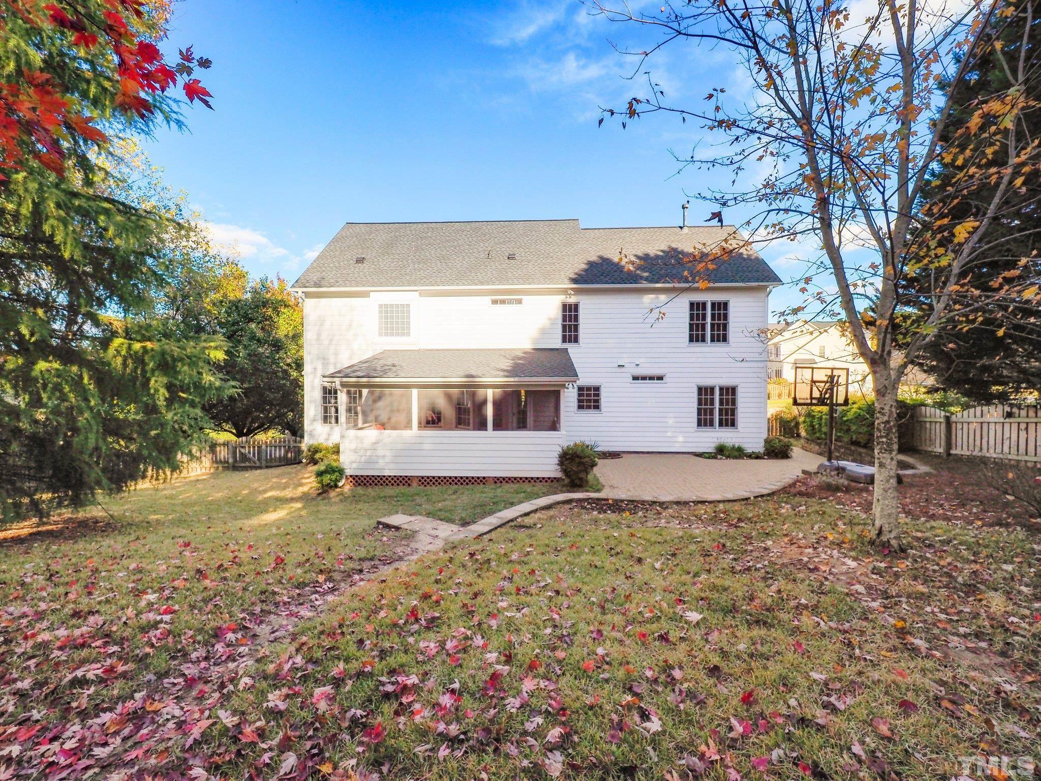 703 Haddon Hall Drive Apex, NC 27502 - Photo 42 of 49 a view of a house with a yard