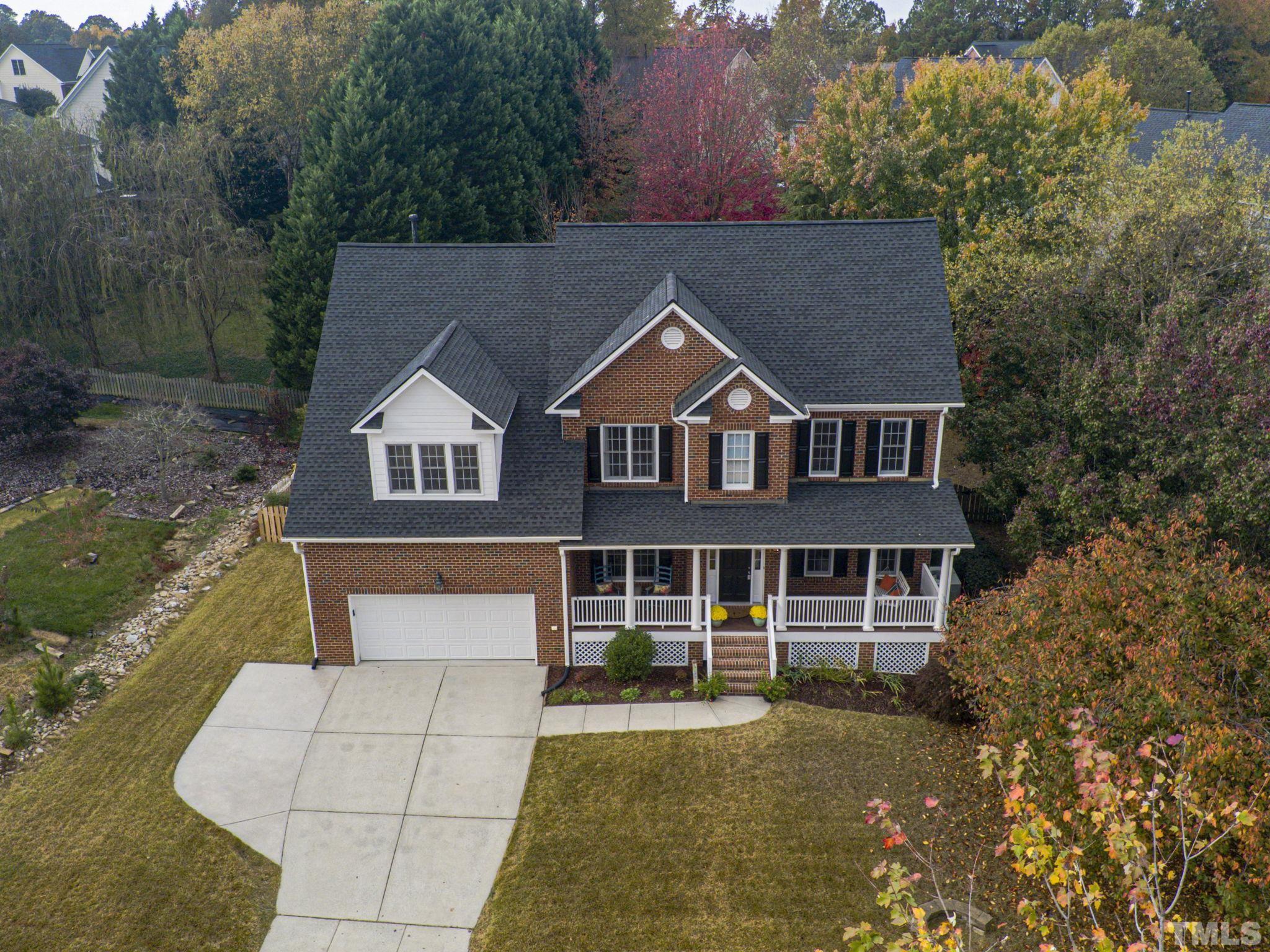 703 Haddon Hall Drive Apex, NC 27502 - Photo 44 of 49 a front view of a house with a yard