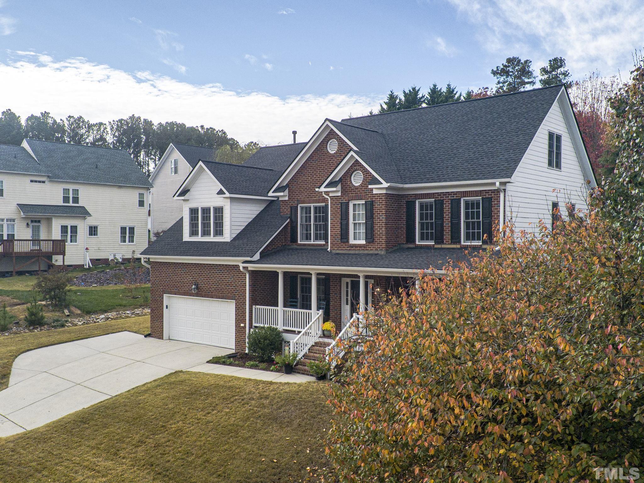 703 Haddon Hall Drive Apex, NC 27502 - Photo 46 of 49 front view of a house with a yard