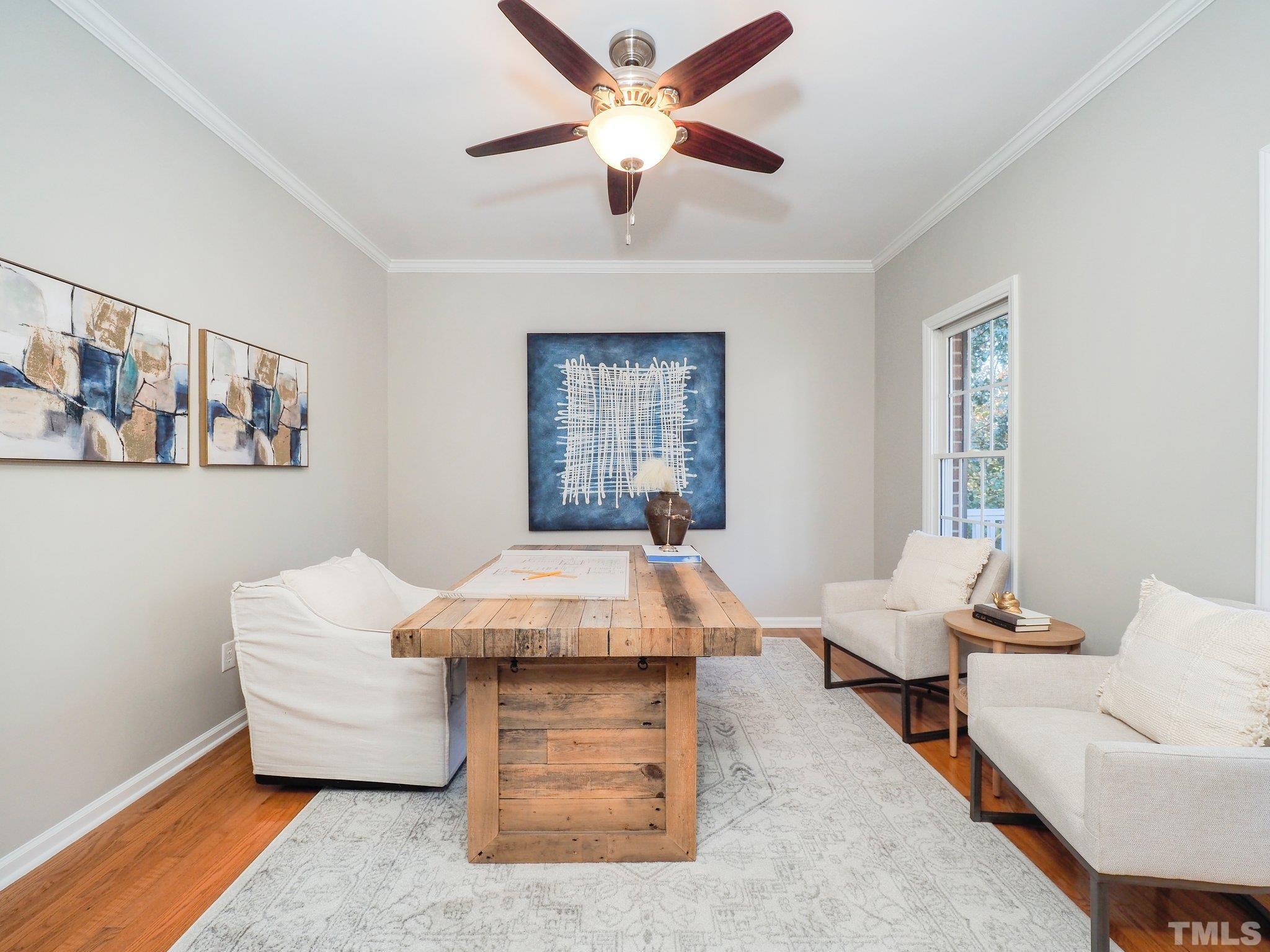 703 Haddon Hall Drive Apex, NC 27502 - Photo 9 of 49 a living room with furniture and a window