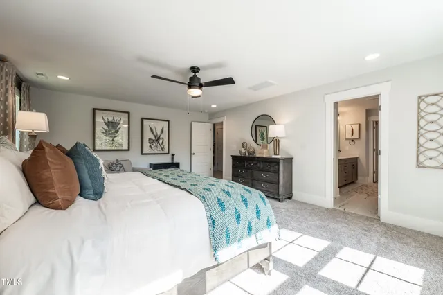 a bathroom with a double vanity sink mirror and double