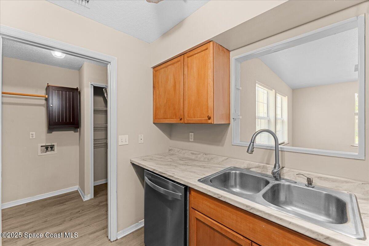 5510 Holden Road Cocoa, FL 32927 - Photo 14 of 51 a close view of a sink and cabinets