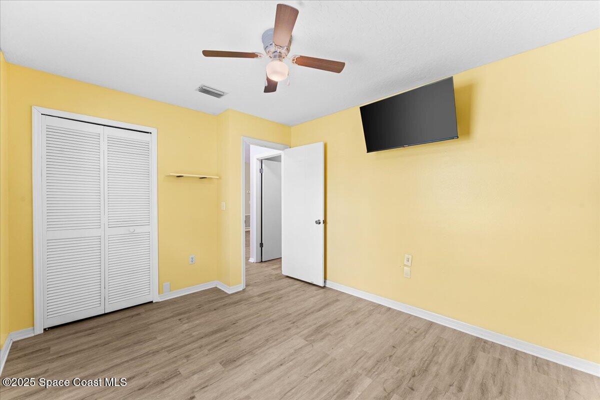 5510 Holden Road Cocoa, FL 32927 - Photo 24 of 51 a view of a livingroom with wooden floor