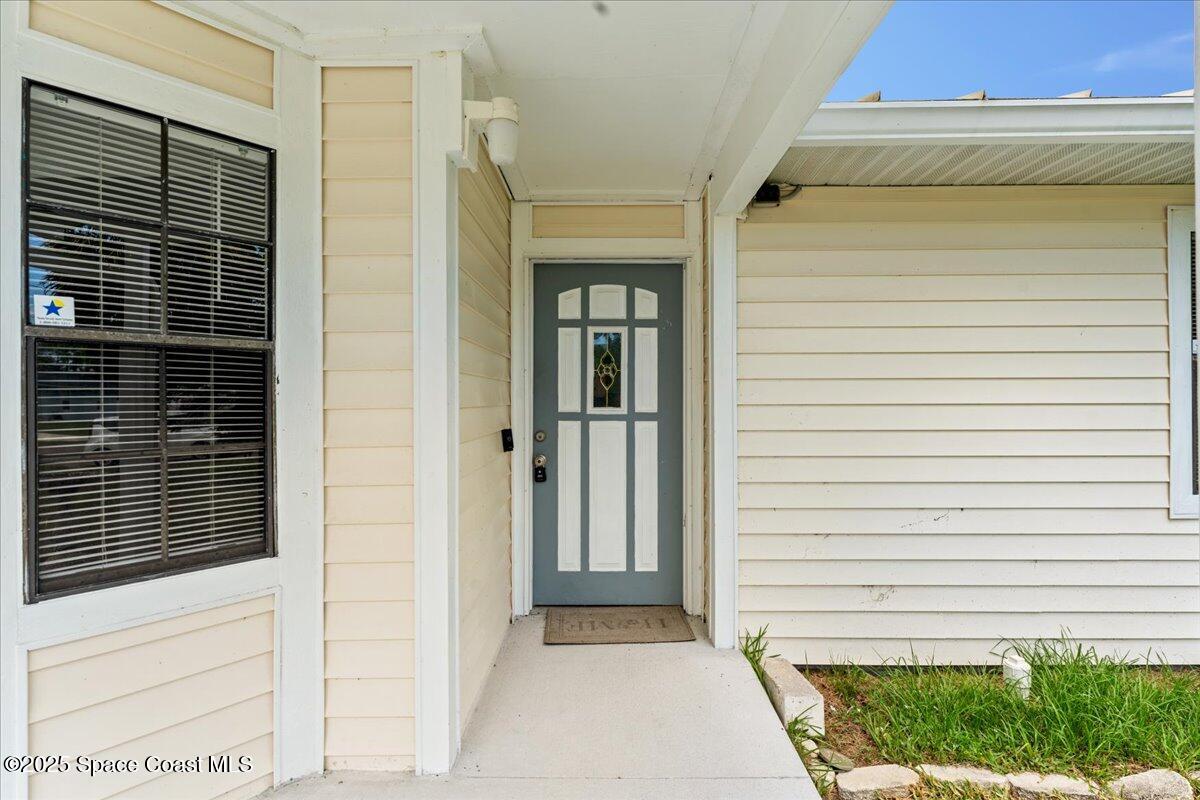 5510 Holden Road Cocoa, FL 32927 - Photo 3 of 51 a view of front door of a house