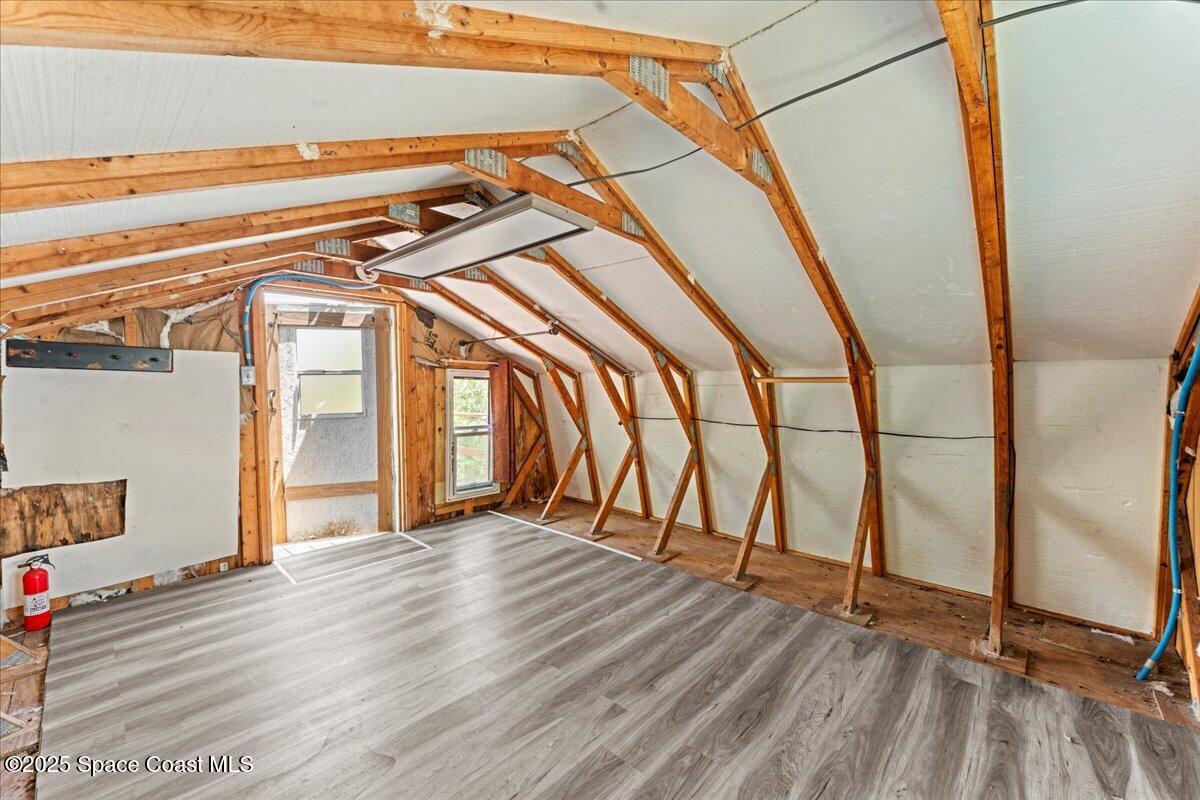 5510 Holden Road Cocoa, FL 32927 - Photo 34 of 51 a view of an entryway with wooden floor
