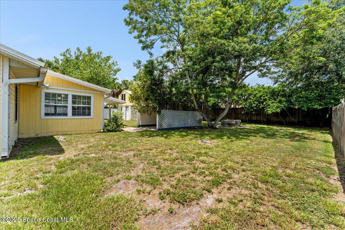 5510 Holden Road Cocoa, FL 32927 - Photo 35 of 51 a backyard of a house