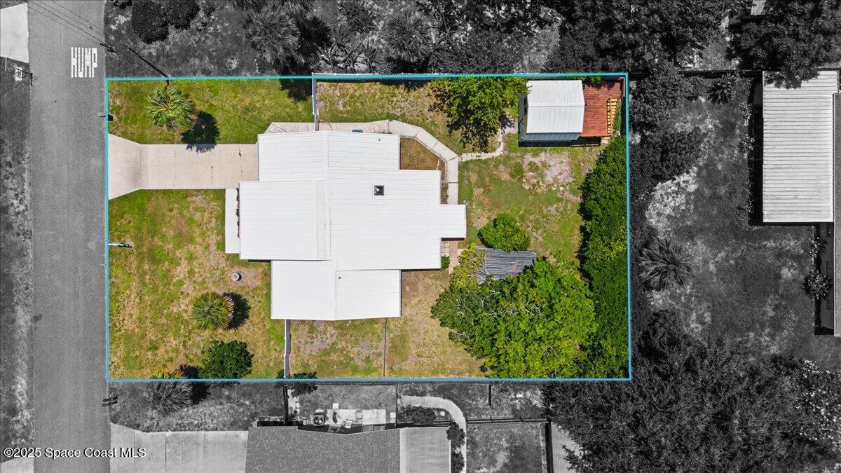 5510 Holden Road Cocoa, FL 32927 - Photo 41 of 51 an aerial view of a house with a yard