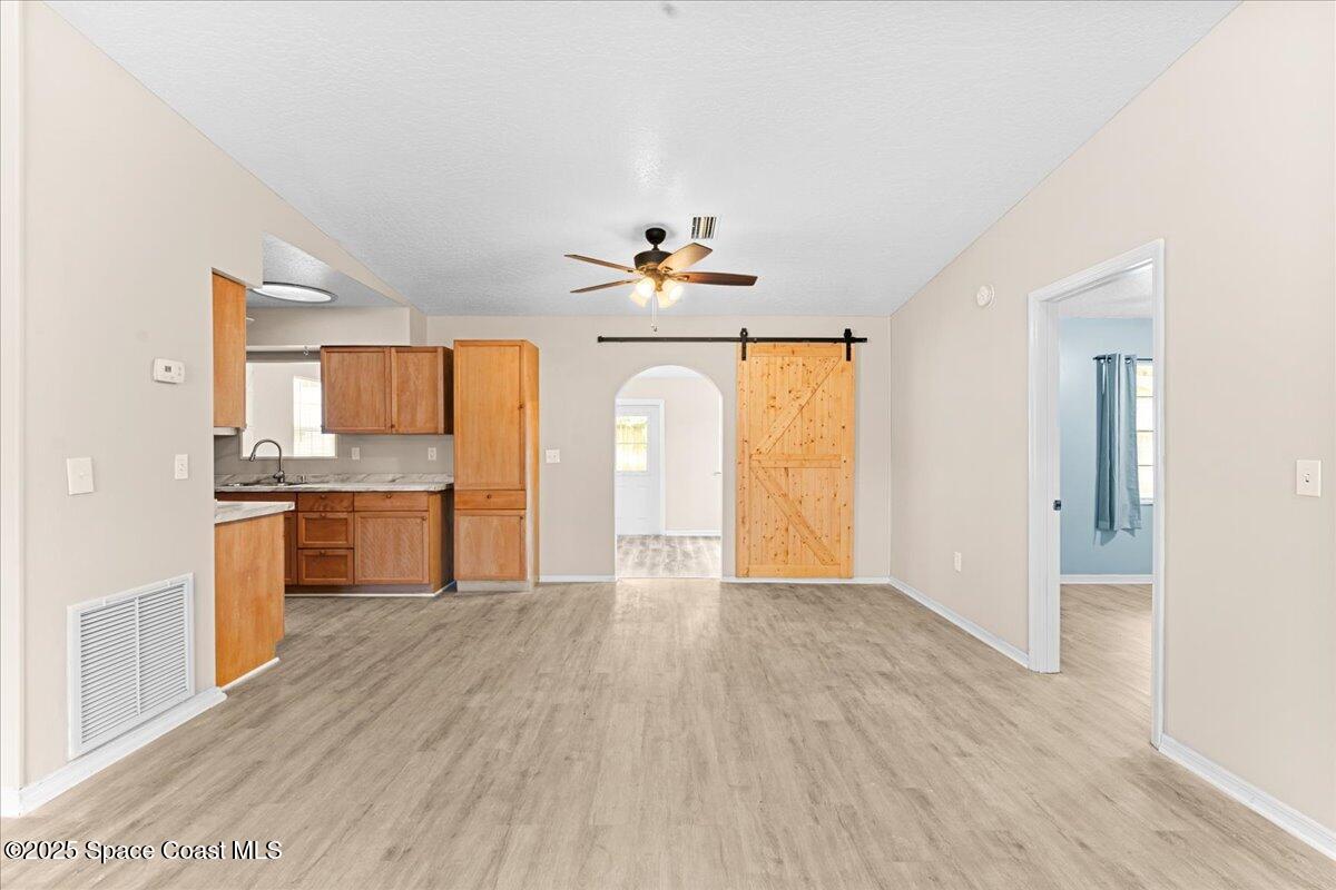 5510 Holden Road Cocoa, FL 32927 - Photo 8 of 51 a view of kitchen with sink and window