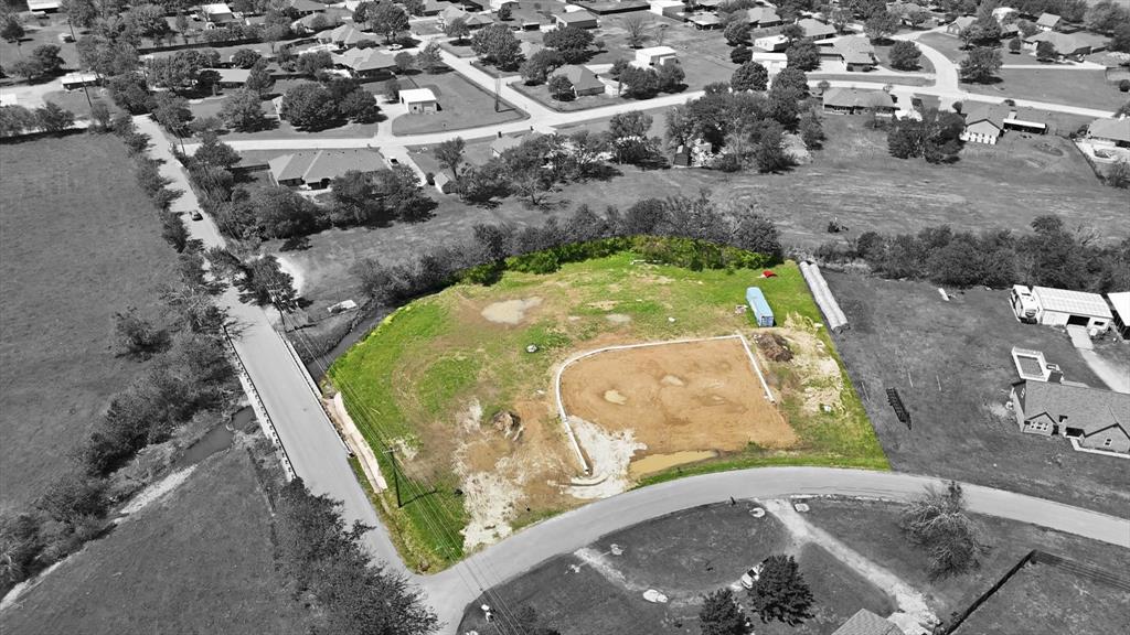 501 Rising Star Lane Sanger, TX 76266 - Photo 1 of 17 a view of a swimming pool with a yard