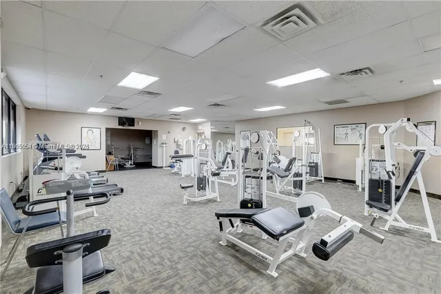 a view of a room with gym equipment