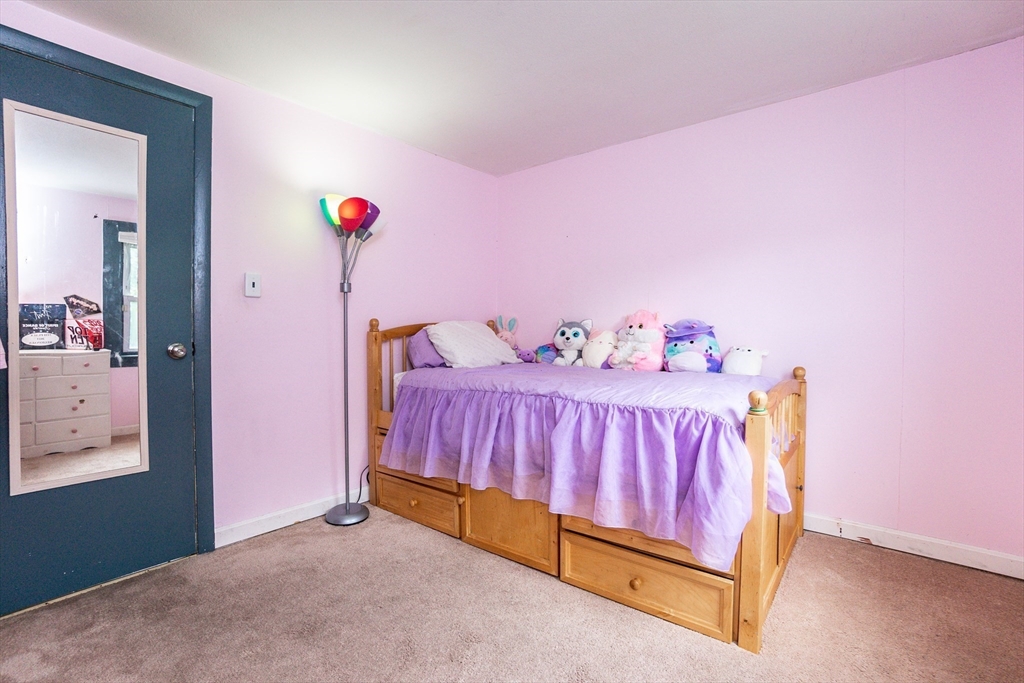 67 West Shore Road Holbrook, MA 02343 - Photo 33 of 42 a bedroom with furniture and a window