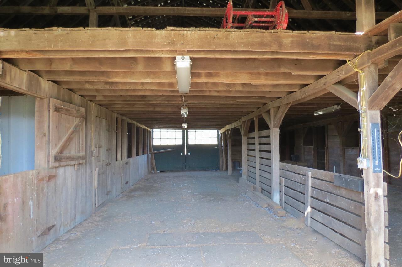 12036 Crest Hill Road Hume, VA 22639 - Photo 26 of 30 Barn has 4 large horse stalls, storage, loft etc