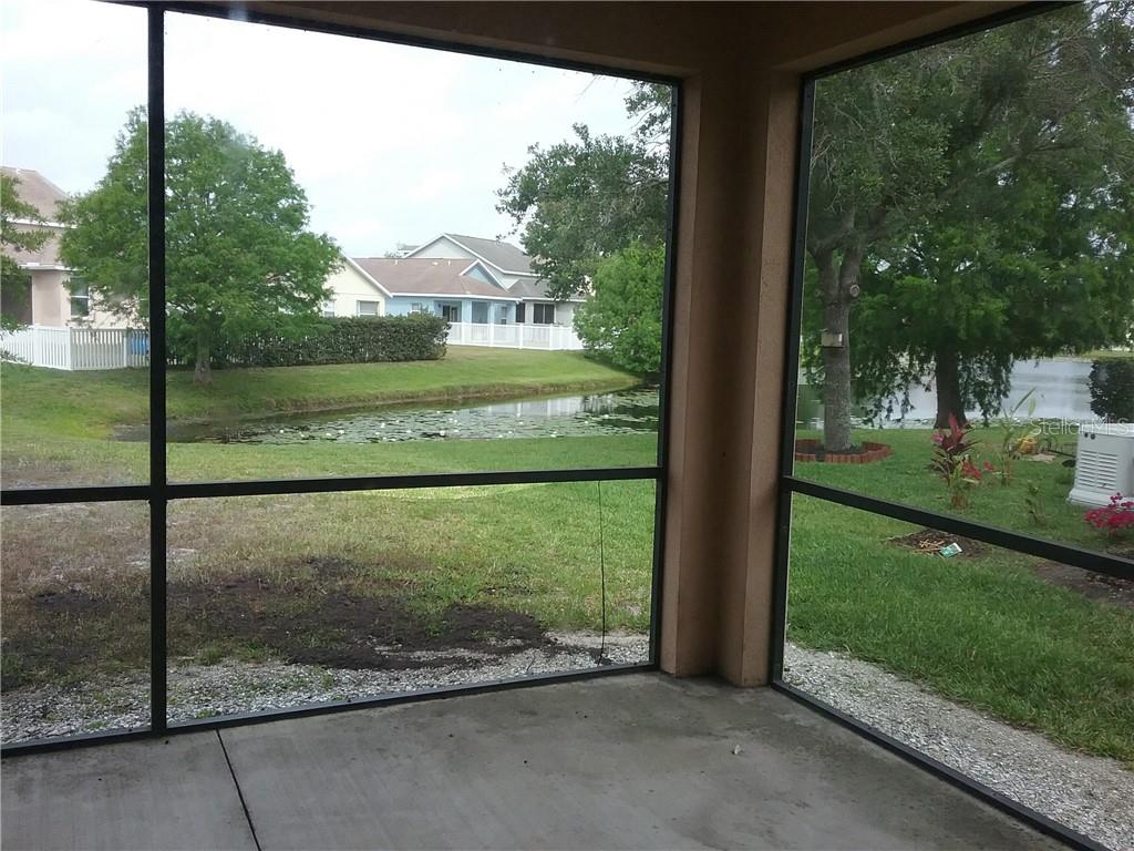 6246 Blue Runner Court Lakewood Ranch, FL 34202 - Photo 3 of 13 a view of a back yard