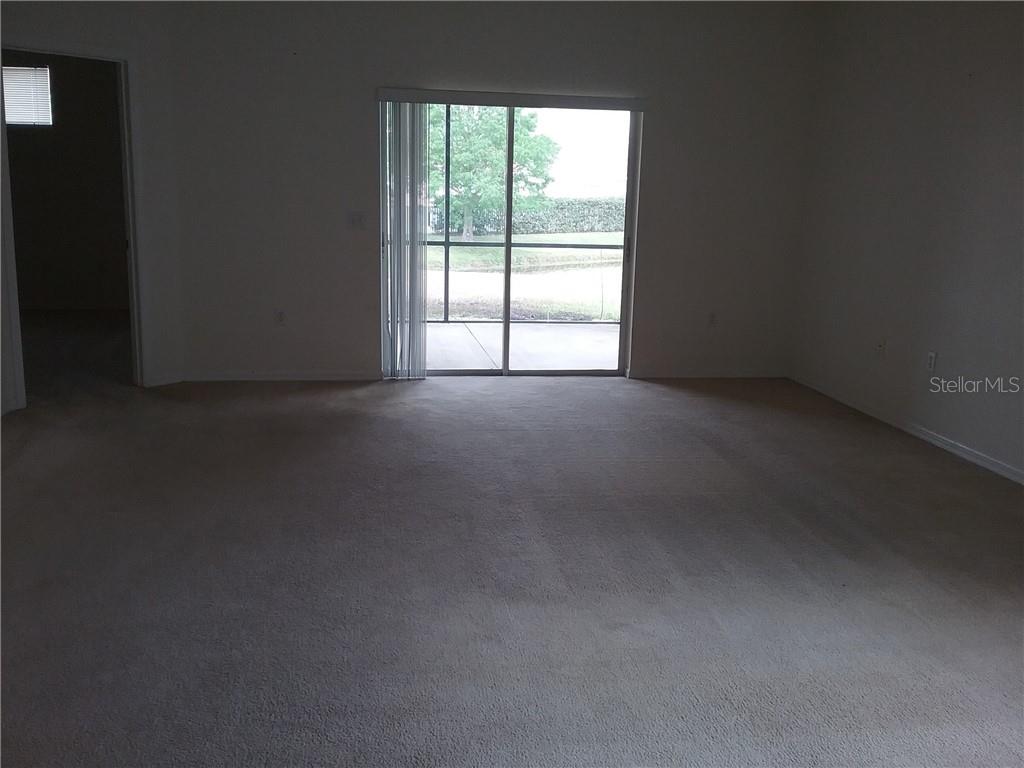 6246 Blue Runner Court Lakewood Ranch, FL 34202 - Photo 7 of 13 a view of a room that has a window in it