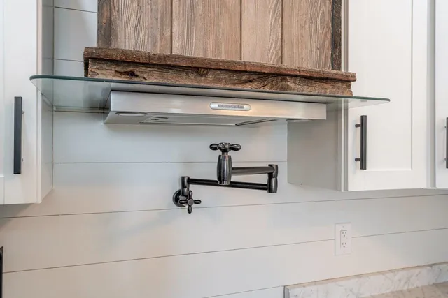 a view of a living room with a large window