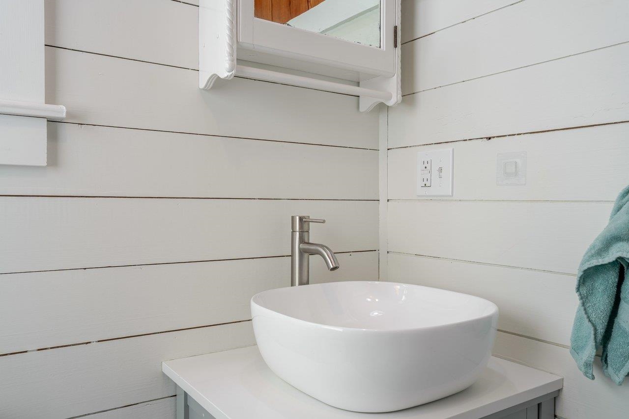 164 Church Street Timberville, VA 22853 - Photo 24 of 68 a white bath tub sitting in a bathroom