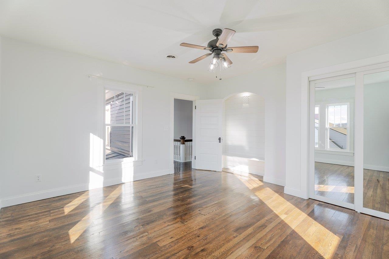 164 Church Street Timberville, VA 22853 - Photo 46 of 68 a view of an empty room and wooden floor