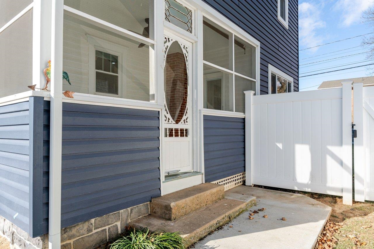 164 Church Street Timberville, VA 22853 - Photo 62 of 68 a view of a house with a door and wooden bench