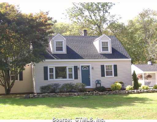 33 Pleasant Point Road Branford, CT 06405 - Photo 1 of 1 a front view of a house with a garden