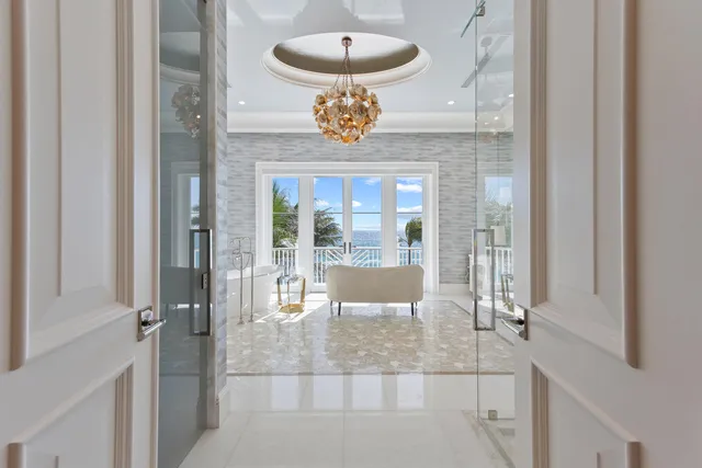 a bathroom with a glass shower door