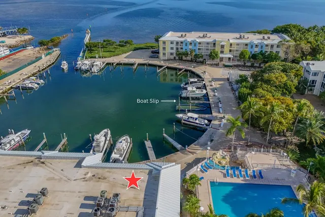 $2,250,000 | 97501 Overseas Highway, Unit 116 & 40' BOAT SLIP, Key Largo, FL 33037